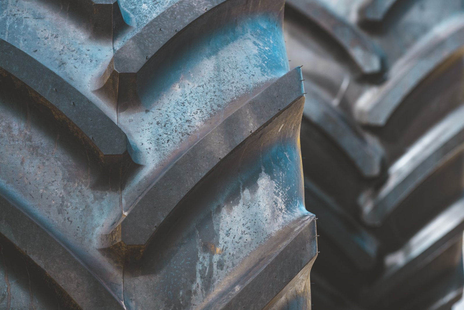 Agricultural tractor tires close up with selective focus
